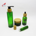 green glass jar with bamboo lid cosmetic packaging container set glass pump bottle bamboo cap BJ-216B